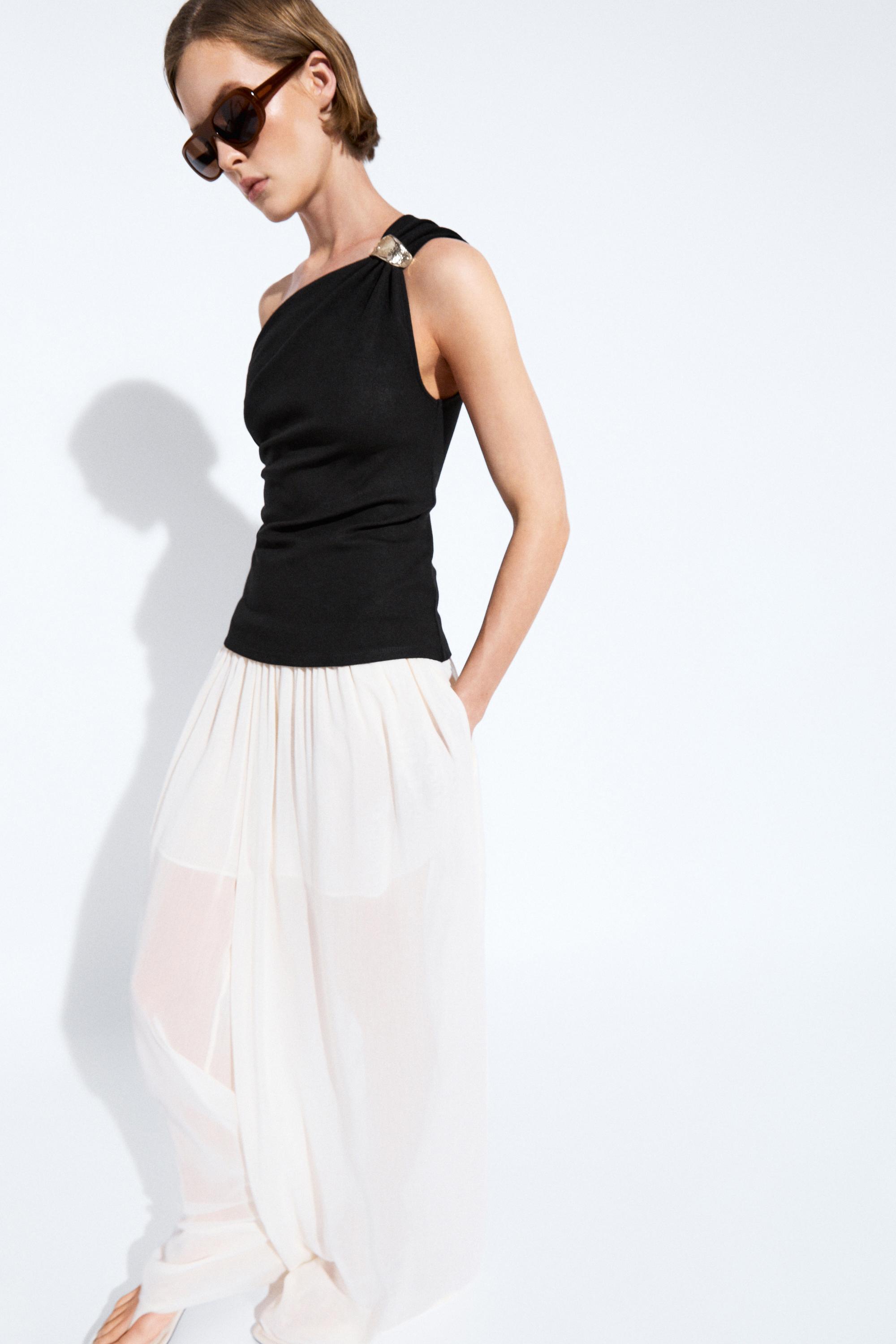 Asymmetric top with metal detail